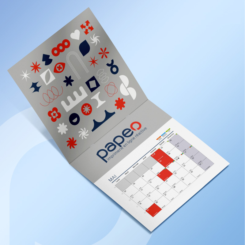 Calendrier agrafé et perforé